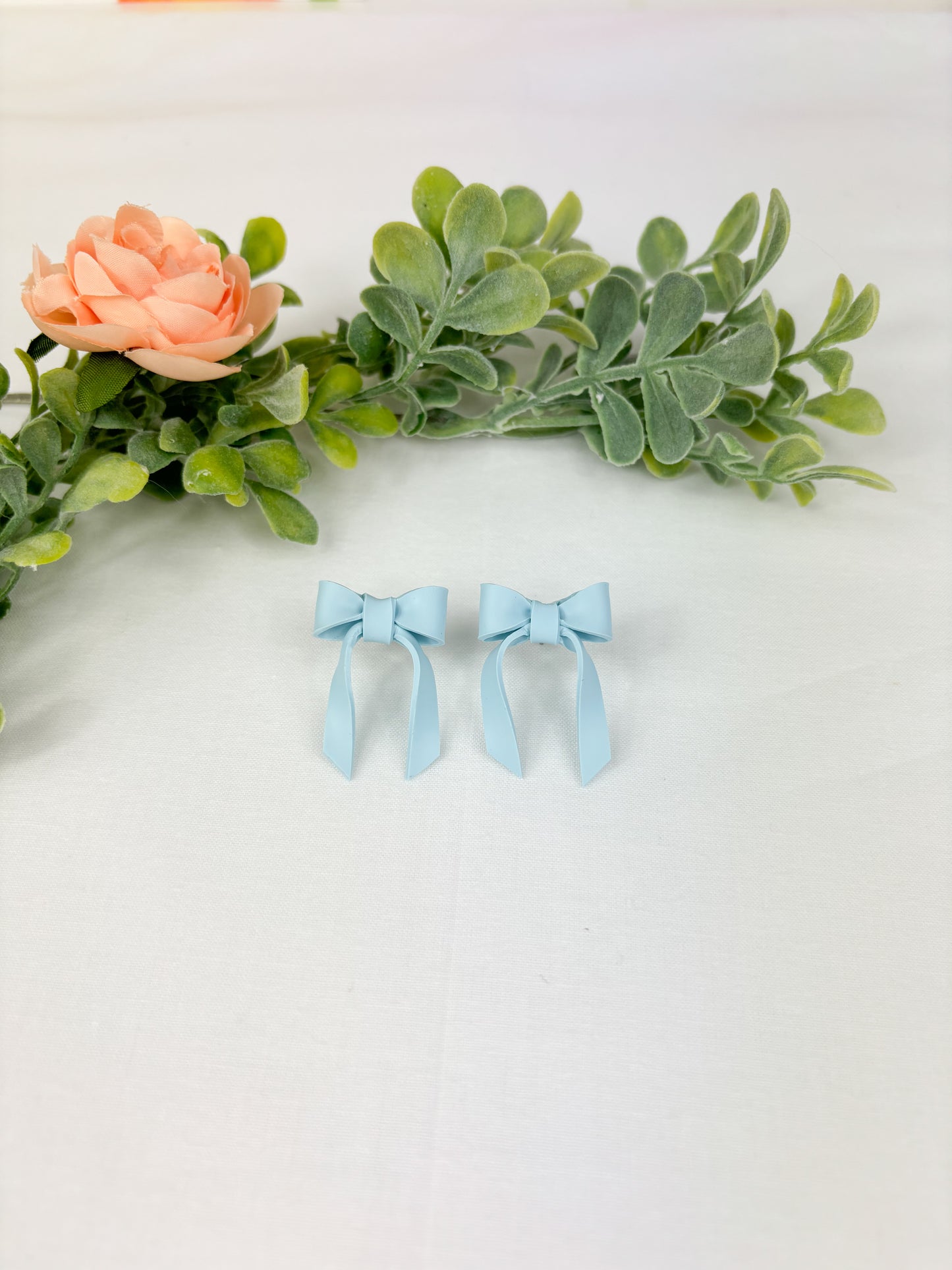 Baby Blue bow studs