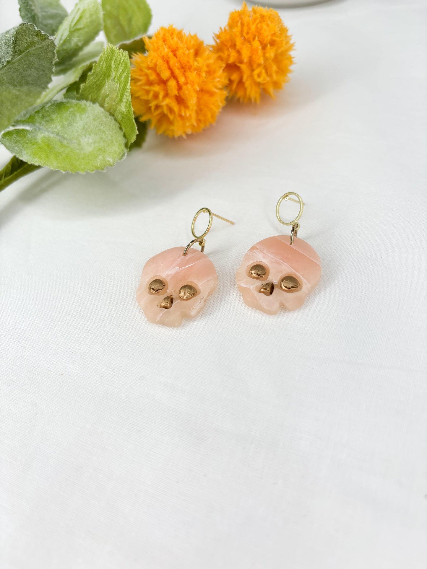 Faux Rose Quartz Skulls