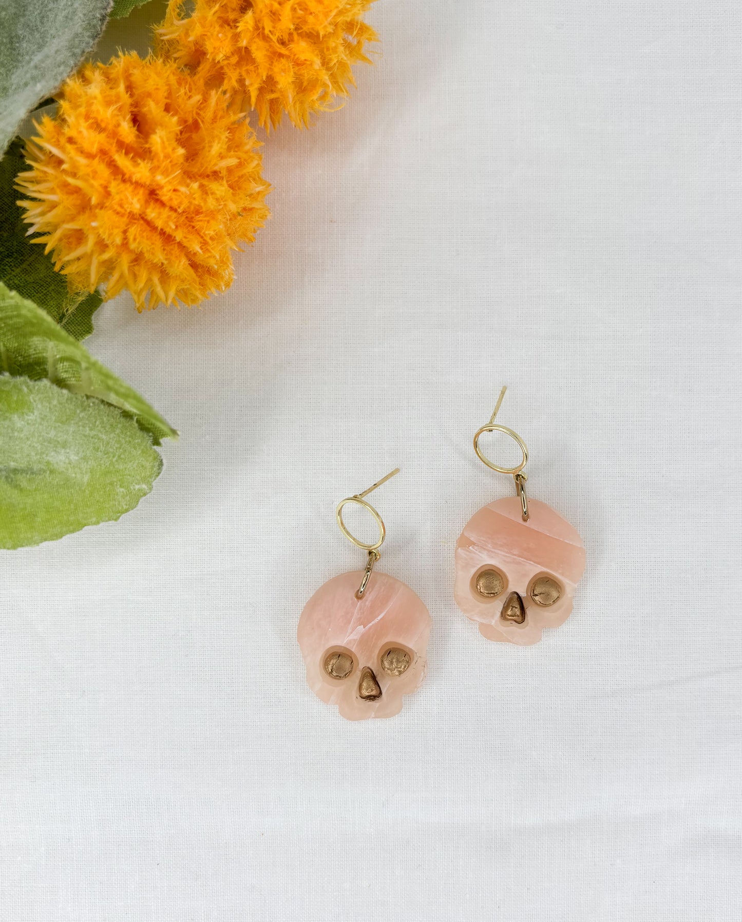 Faux Rose Quartz Skulls