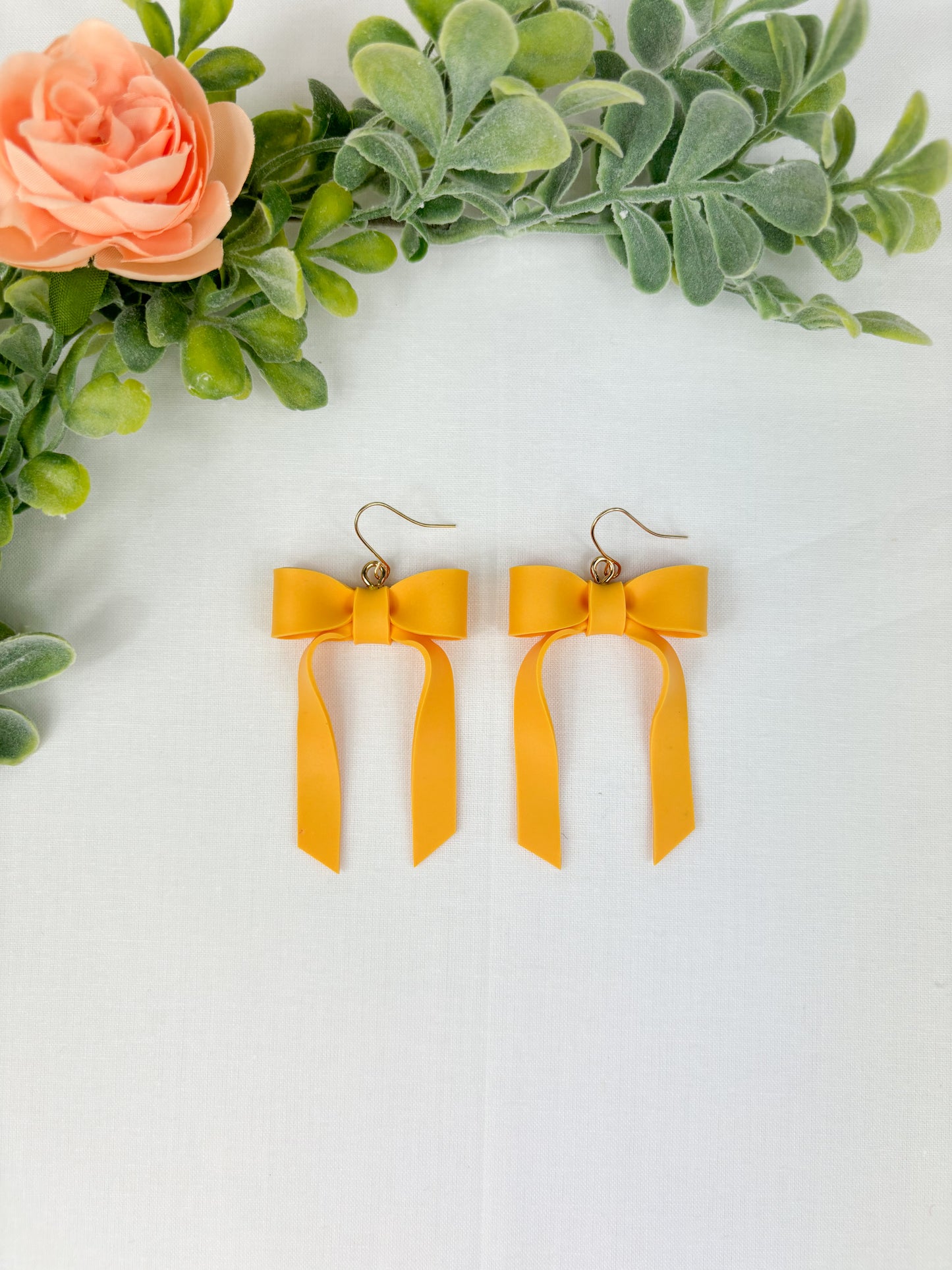 Mustard bow dangles