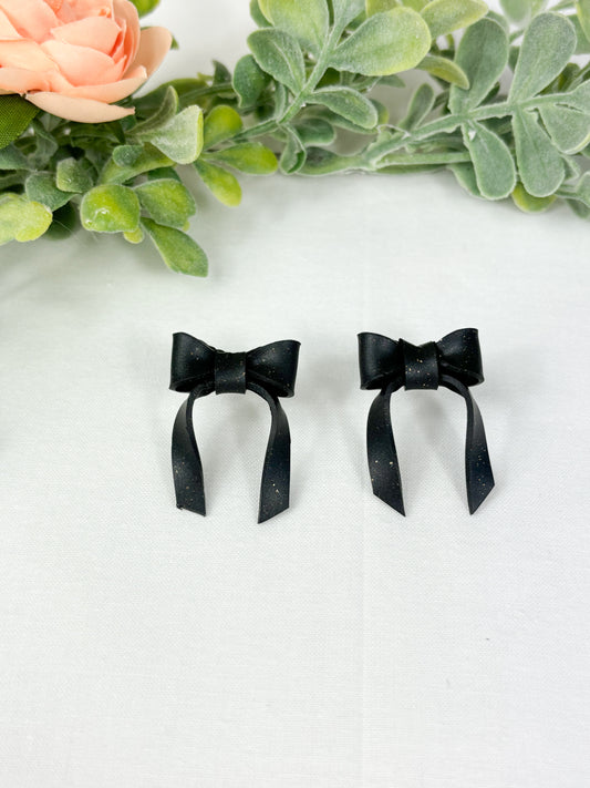 Black bow studs